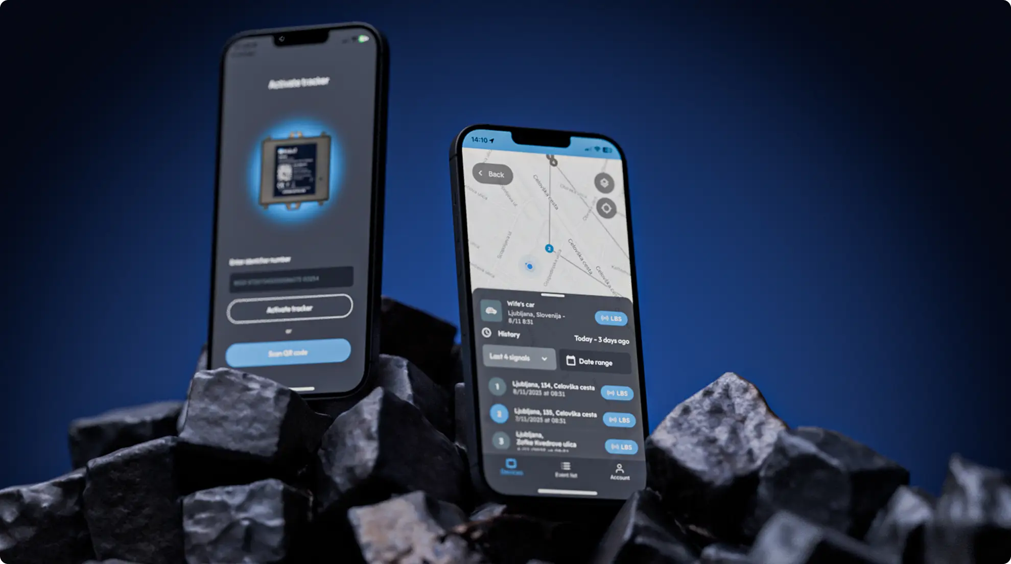 Phone screens showing a dark interface on a rocky surface
